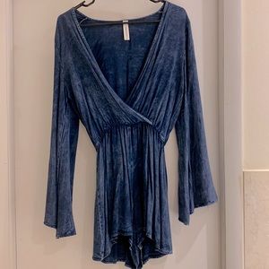 Distressed denim long sleeved romper